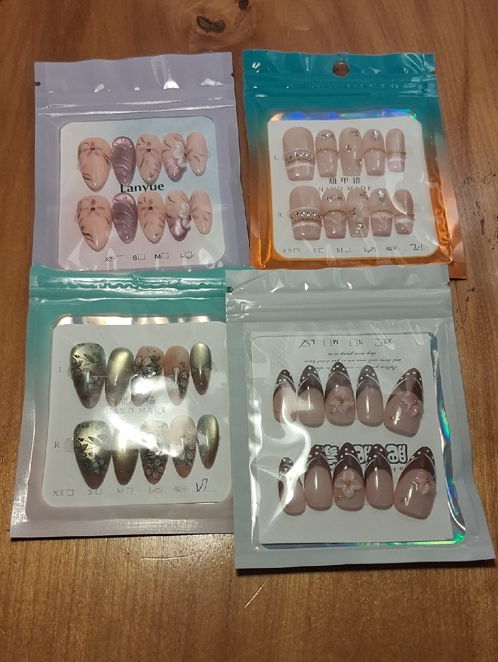 Pack of 4 Press-On Nail Sets in Nude, Pink and Metallic Accents Size Large